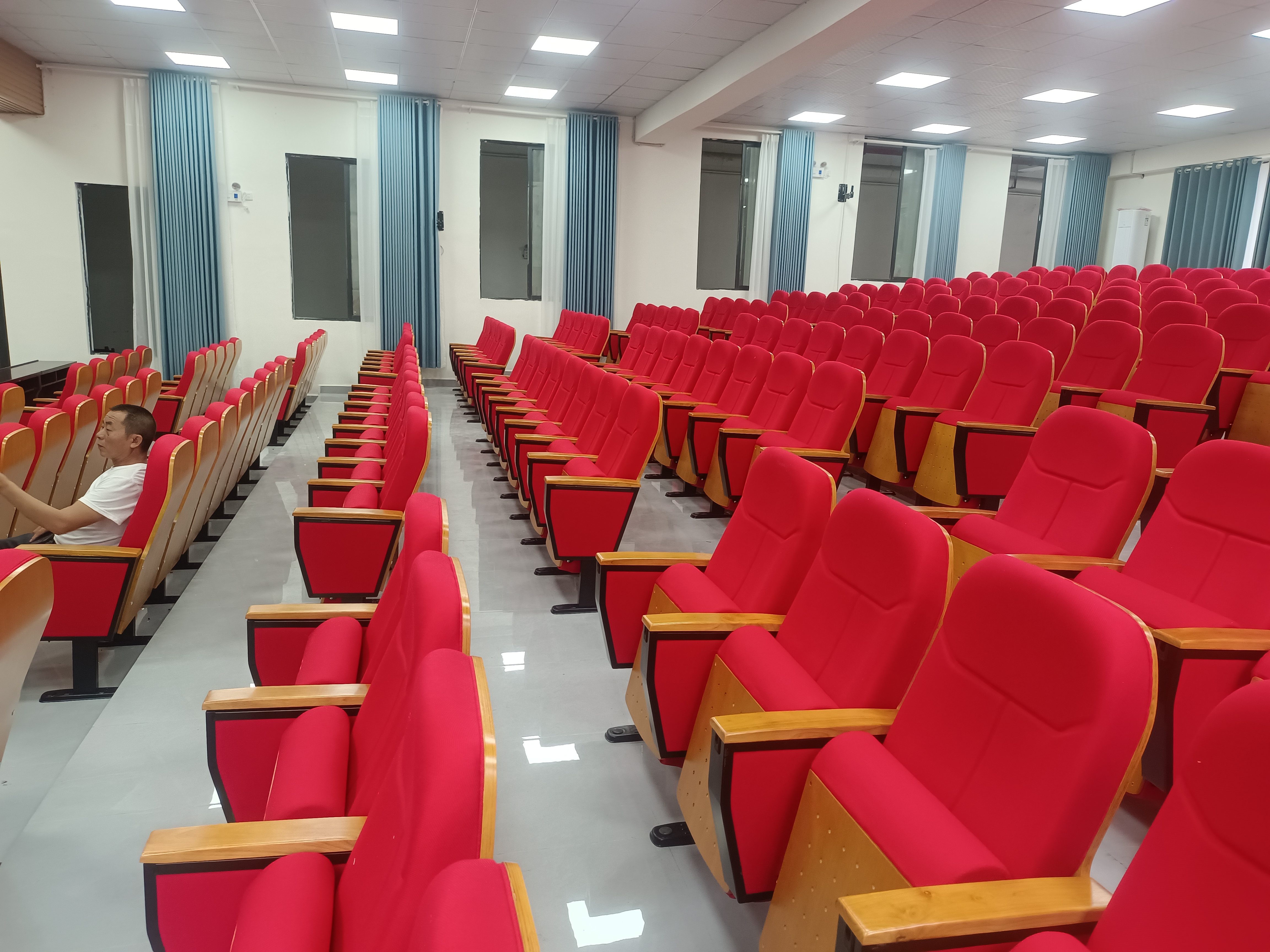 Completed red lecture hall seating installation